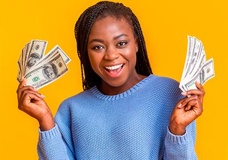 student holding money