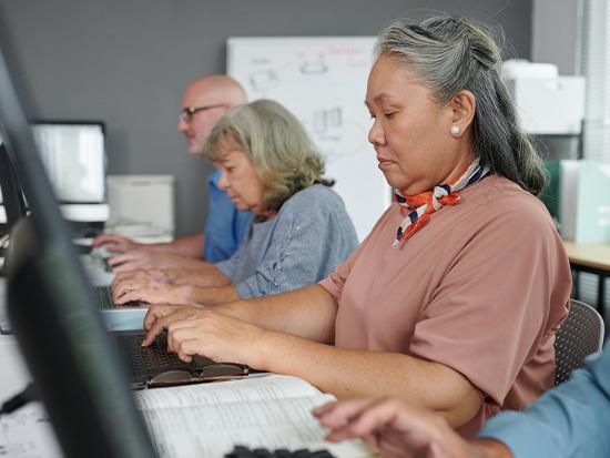 senior students working on computers