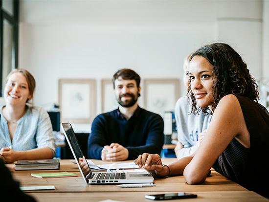 business professionals sitting at conference table