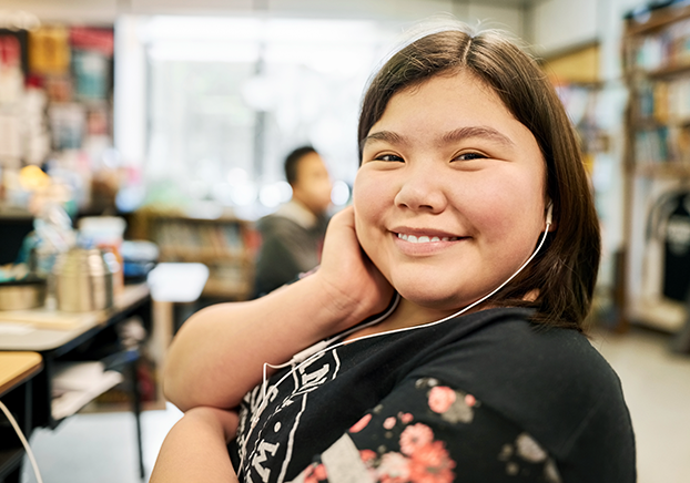 happy high school student in classroom