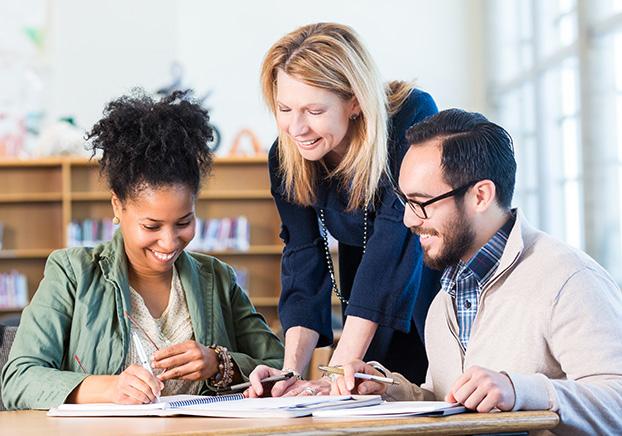 instructor helping students