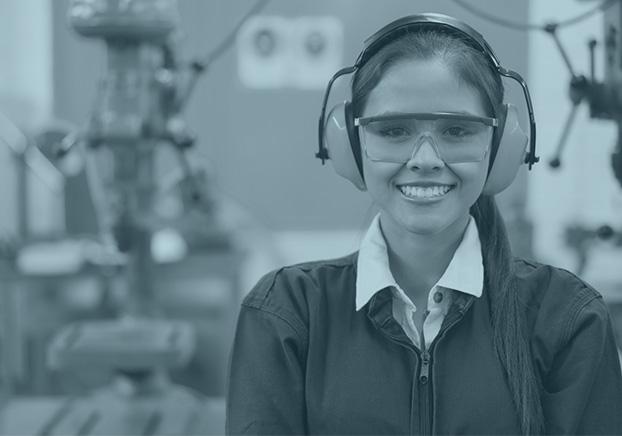 student with ear protection in robotics lab