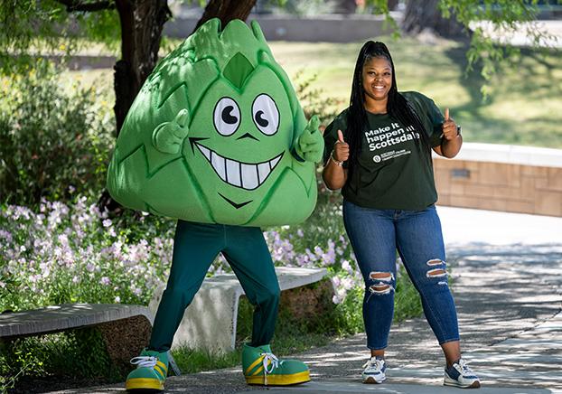 student with artichoke mascot